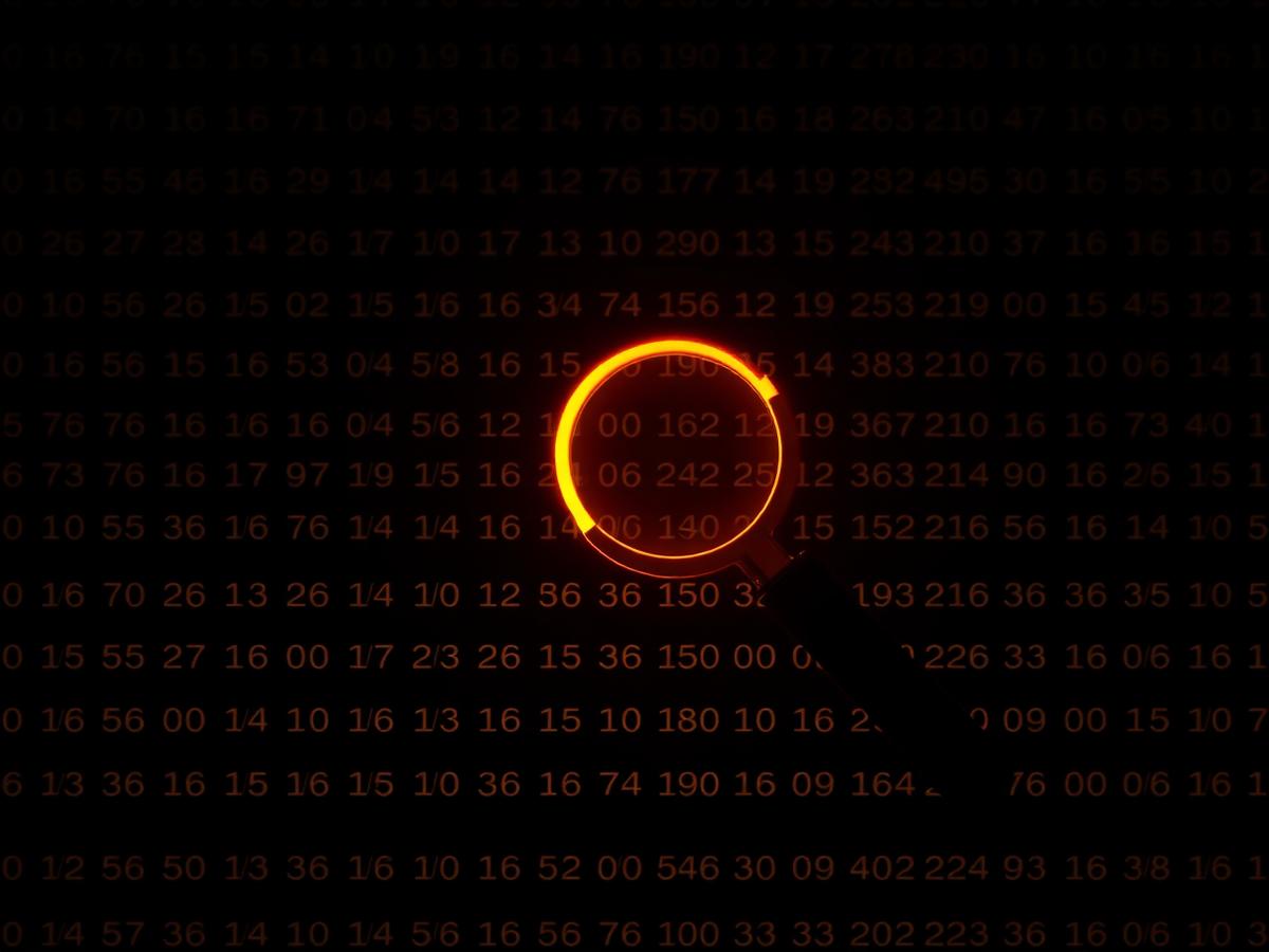 Illuminated magnifier over a field of search data representing keyword research